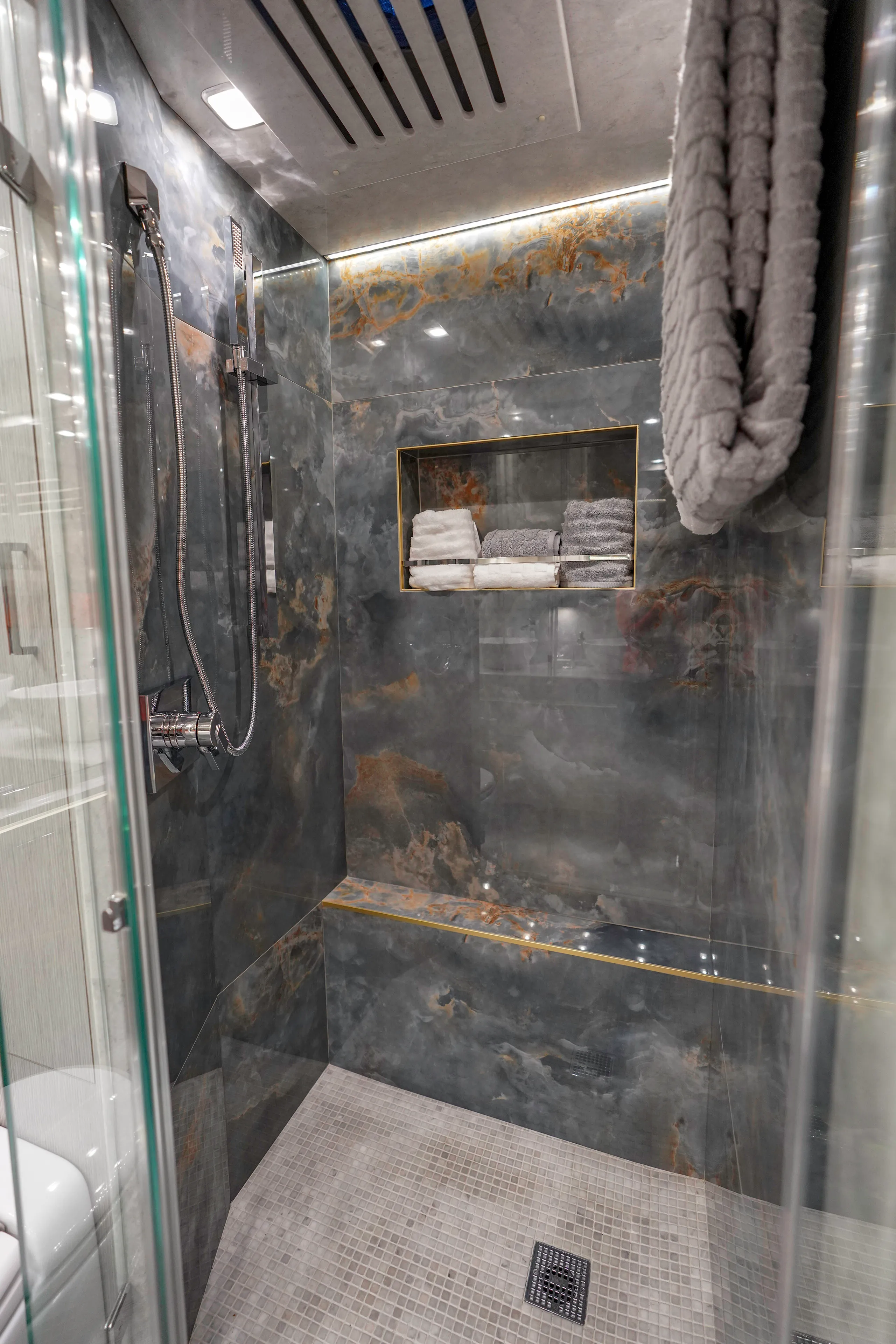 A marbled bathroom interior with fine tiles