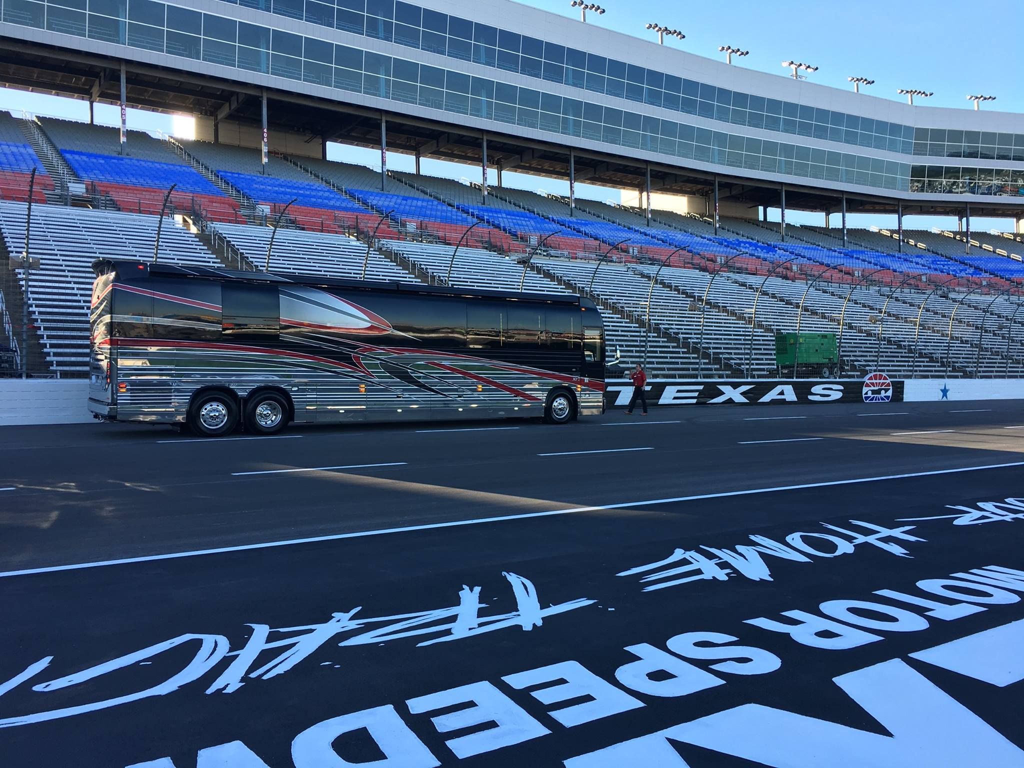 A coach parked on a motor track